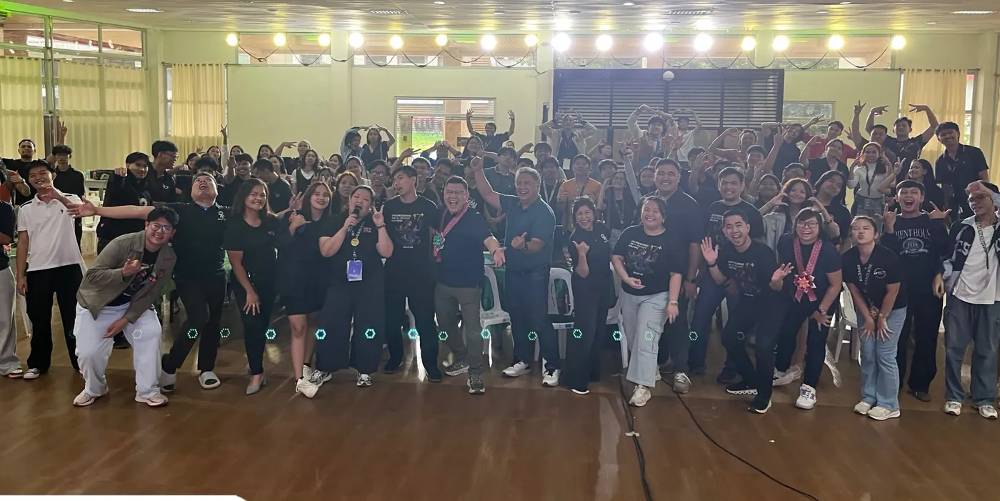 Students, chapter leaders, mentors, and partners cheering together after the Bukidnon AI Fluency Masterclass and Hackathon