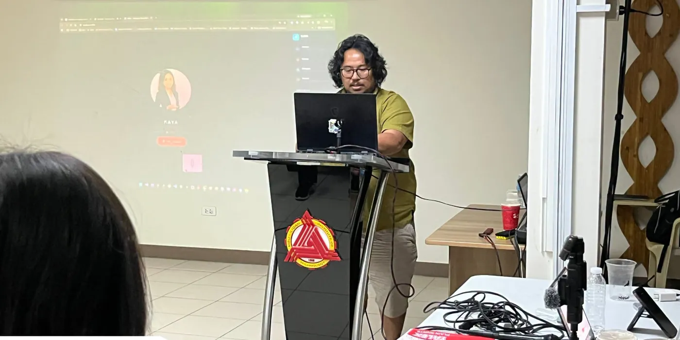 A mentor leading the AI Fluency Masterclass from the MSU-IIT podium