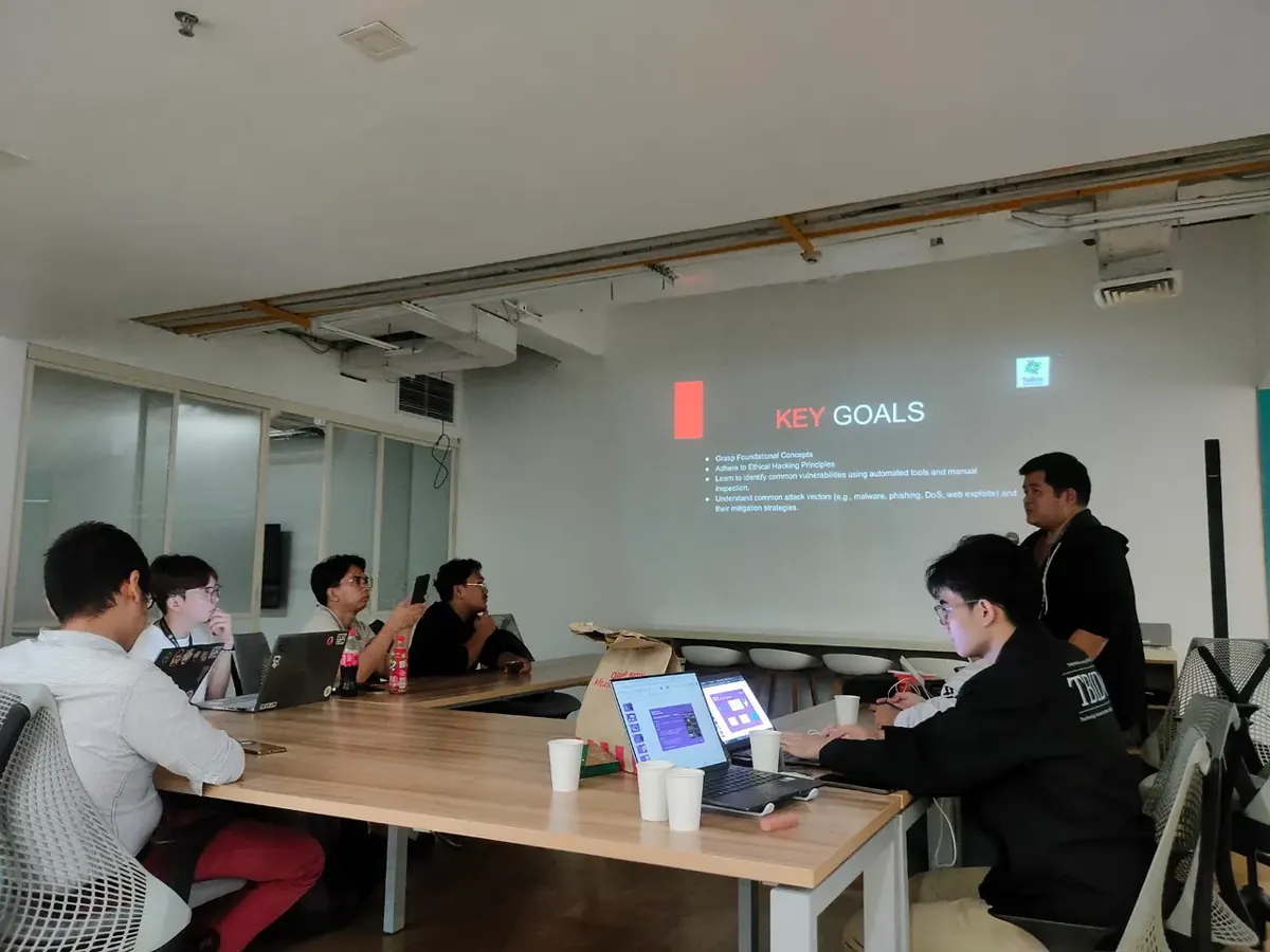 A mentor presenting the key goals of an ethical hacking session